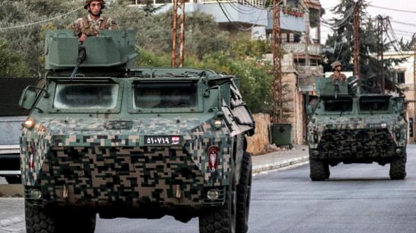 Lebanese Army vehicles patrol the town of Marjaayoun in southern Lebanon near the border with Israel on October 25, 2024. (AFP via Getty Images)