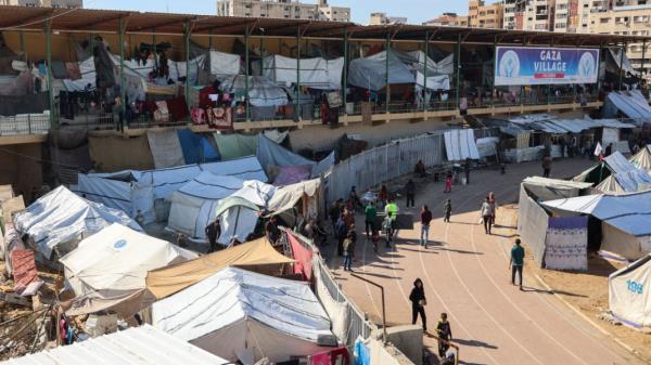 Tents sheltering displaced Palestinians are pictured at the Yarmouk Sports Stadium, o<em></em>nce a football arena, in Gaza City on 19 November 2024